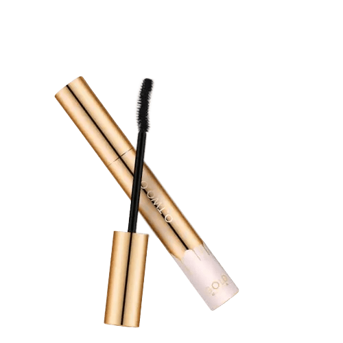 a mascara with a brush on top of it